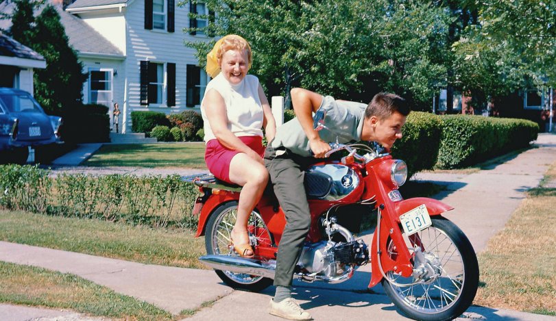 St. Catharines, Ontario, Canada, 1966, and I'm hamming it up on my older brother's 1964 Honda 90, with our neighbour and close family friend on the rear. I had just received my driver's license and like all my buds, getting driving privileges at your 16th birthday was top priority. Without game stations, cell phones or the internet, surfing with wheels "in real time", like in American Graffiti, was a big part of the social scene. View full size.
