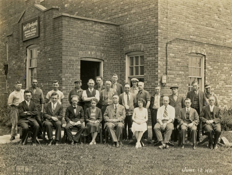 Employees of Lord &amp; Burnham Company, greenhouse designers and manufacturers, St. Catharines, Ontario, Canada. This photo was taken outside the factory on Welland Avenue on June 12, 1931. The distinguished gentleman ensconced between the two ladies is my great-grandfather, Edmund I. Lorenzen. View full size.
