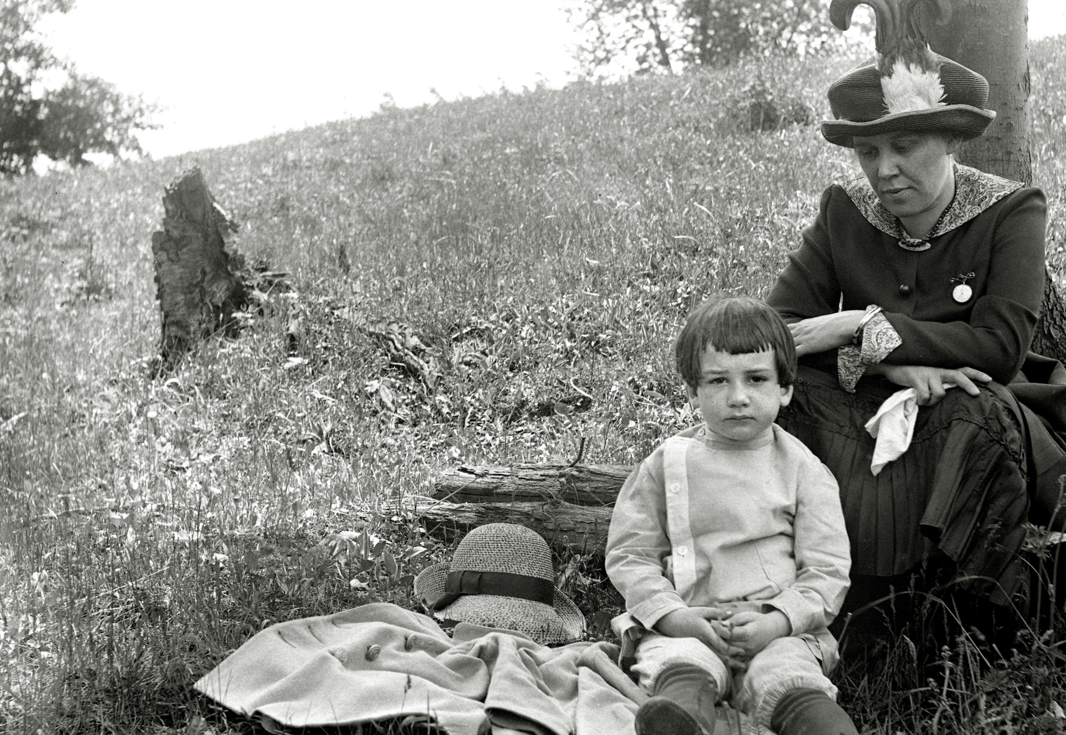 From the collection of film and 4x5 glass negatives I recently purchased; they seem to be circa 1912, taken in upstate New York. This is one of my favorites.  The love and pride are evident. It occurred to me, looking at this, was that this child is a contemporary of my father, who was born in 1908 and died three months after his 91st birthday in 2000, and I wondered about his life in that context.  It would be nice to have answers. View full size.