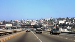San Francisco, March 1969. Taken from the front passenger seat, US 101 northbound at the Vermont Street exit. Love the Bobbie Gentry and Sammy Davis Jr. Harrah's billboard and the late 1950s Bentley cruising serenely in the southbound lane. View full size.
In 2016June 2016 Google street view.

(ShorpyBlog, Member Gallery)