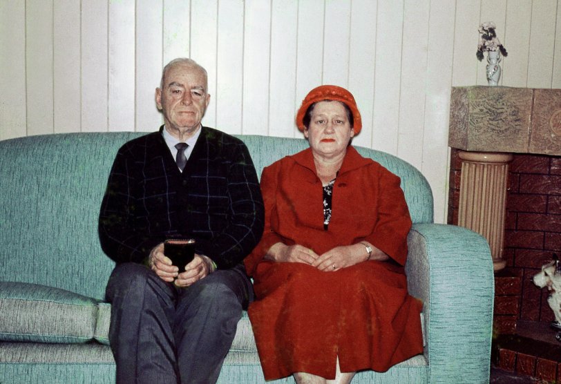 My wife's grandparents all dressed up for church posing together on the vinyl couch in the early sixties. Scanned of an old Kodachrome slide. View full size.
