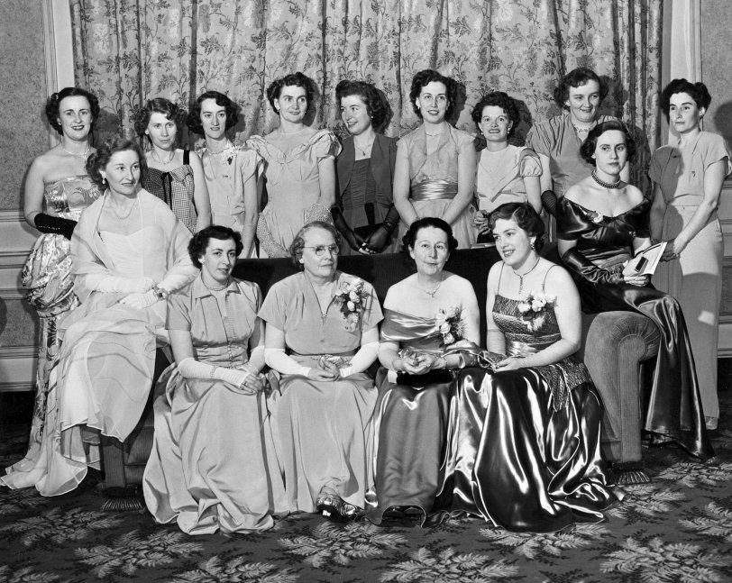 This photo was taken in the early 1950s in Halifax, Nova Scotia. The Imperial Order Daughters of the Empire was the gathering, and the ladies are wearing their best outfits. My maternal grandmother, Edith Wilson, is seated third from the left in the front row (wearing glasses). She was also involved in the Orphan's Fund in that city, and this may have been a fund raiser for that group. Both maternal grandparents lived to 94. You can read more about the IODE here.  View full size.
