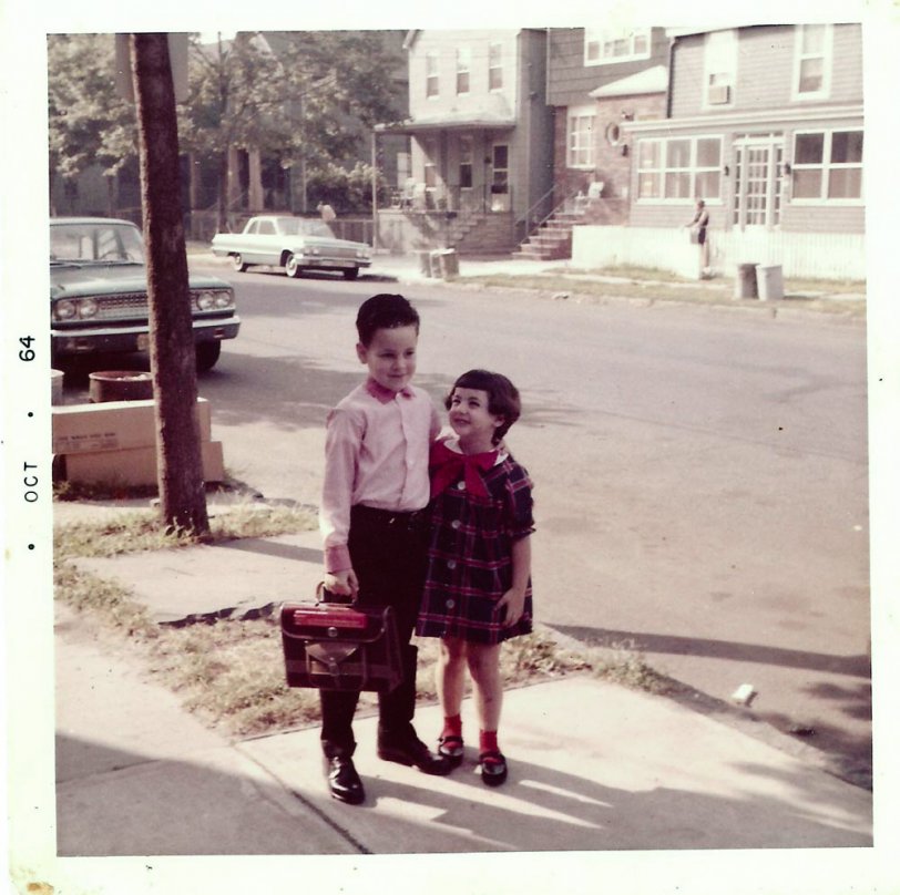 This is a photo of my sister and a neighbor, probably taken in early 1964, on Pamrapo Avenue in Jersey City, NJ. This was a neighborhood on the brink of change. A public housing project was built on the next street over in 1959, originally intended for fixed-income seniors. By the late '60's, the infamous Curries Woods projects (which Ted Koppel devoted several Nightline episodes to around 1990), was becoming a breeding ground for crime, as younger, lower-income people replaced the seniors. My family moved to the suburbs in 1967 (the year after I was born), as the area was no longer a safe place to raise children. View full size.
