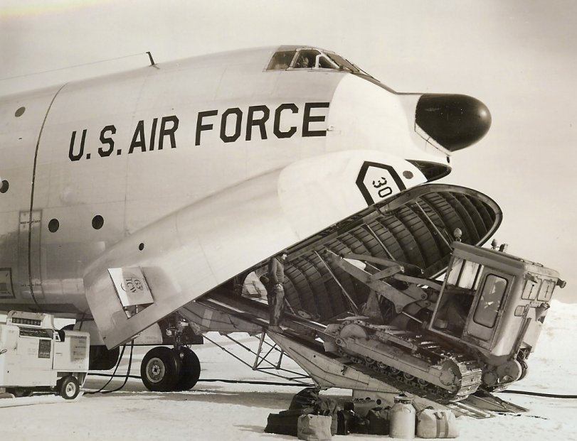 OK, what type of aircrat is this? Another image of resupply at McMurdo Station, Antarctica during the "Winter Over" of 1963. View full size.
