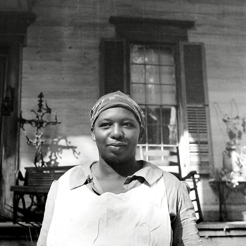 Picture is of the same house as "Shabby Greek: 1939", taken about 2 years later by my parents.  The woman was the caretaker and the only person in residence the the time. View full size.
