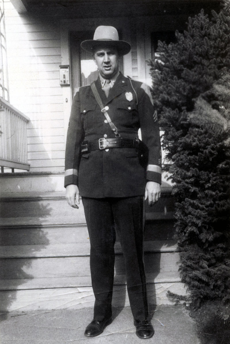 This is my grandfather, Harry Ritchie, also known as "Kiddo," standing in front of his house in Bristol, Connecticut. I believe this image was taken around 1940-41. Kiddo was a sergeant in the Connecticut State police for well over 20 years. View full size.
