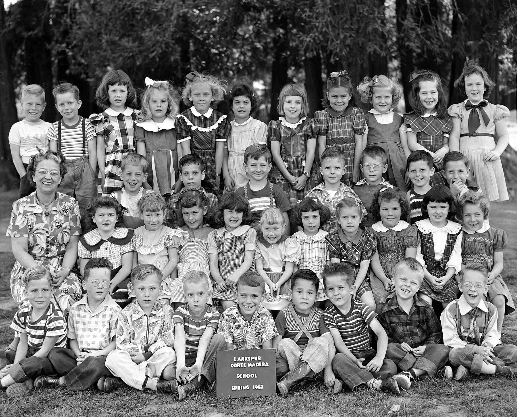 Baby boomers, first wave, all born 1946, showing how we were dressed for kindergarten. Notice how we don't look like gang members, convicts or concentration camp inmates. Of course, for class photo day, most of us had probably gotten decked out a bit better than normally, but still. By the following year a new school had opened up in Corte Madera and our class size shrank dramatically. That's me at the bottom right. View full size.