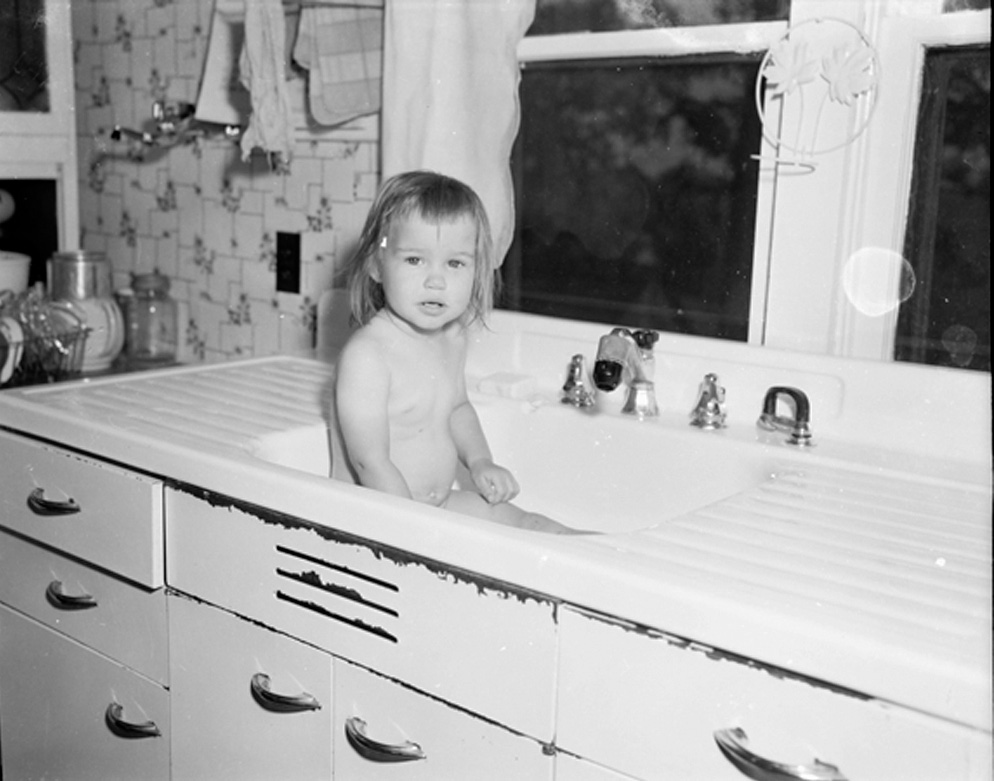 This is my older sister in our first Home in Harvey, IL. I think the year would be around 1953. View full size.