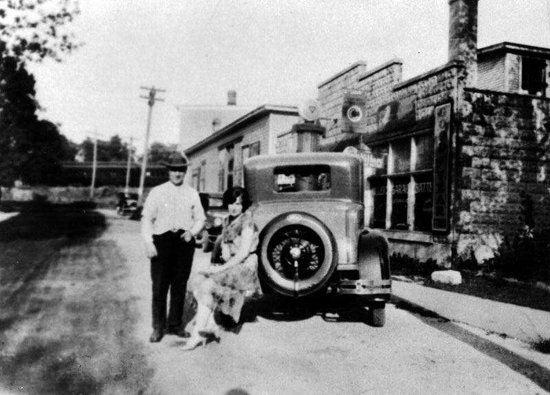 This is a picture of my great grandfather Charles Kruspe and Sarah Kruspe (not sure what the relationship is just yet...I think she is his niece) outside of the Standard Oil Garage he and his brother Albert owned in the 1920s and 30s. View full size.