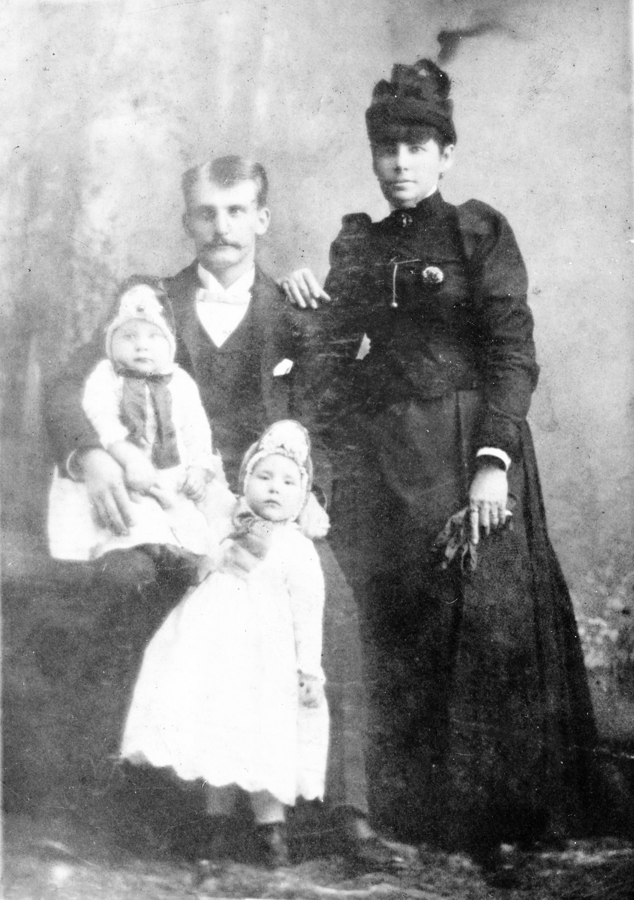 Family portrait in Marietta,Georgia, from 1923. Franklin Kuykendall, Maggie Mae Brooks, Lila Mae and (standing) Mary Louise.