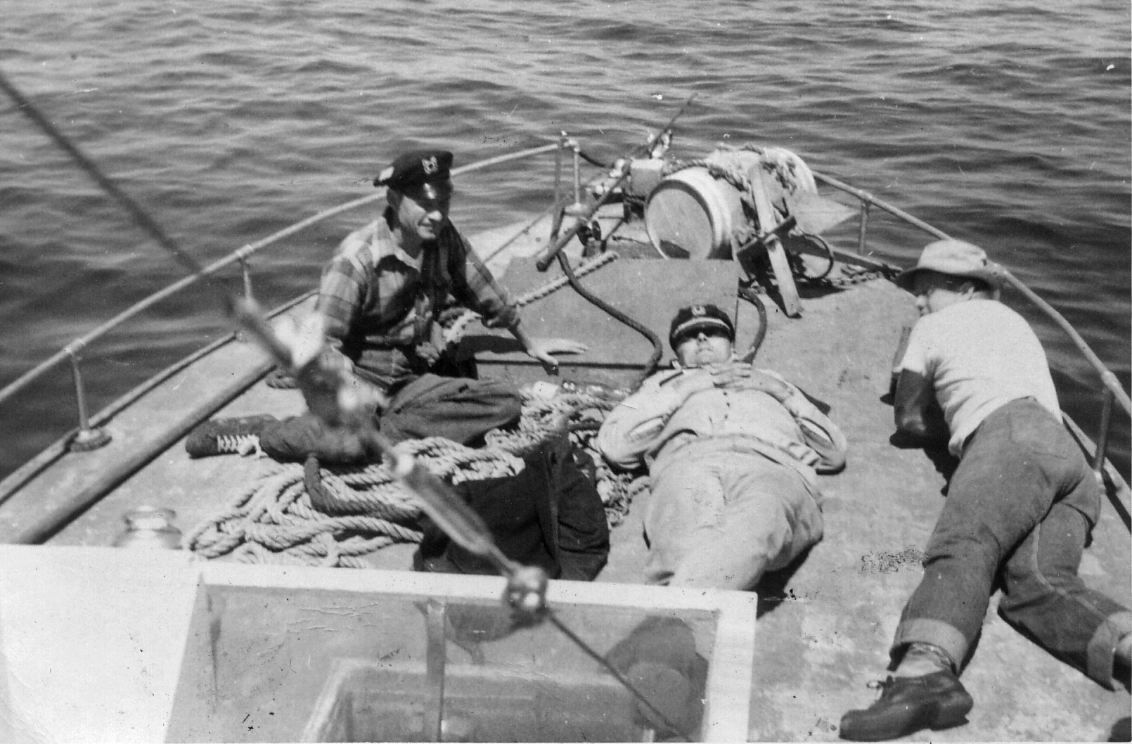 Grandpa Frank on the left and two of his buddies after a long day of fishing. Watch out for the buoy ahead. View full size. 