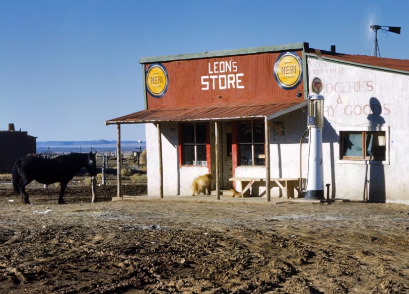 Spring 1943. Closeup of the J.D. Leon general store in Cerro. Taos County, New Mexico. 4x5 Kodachrome transparency by John Collier. View full size.