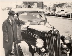 1967. Grandpa Leonard Hermonson and his 1936 Plymouth. Originally it was my Great Aunt Ella's; she gave it to my grandfather when she could no longer drive. This picture was taken in Rockford, Illinois, by a photographer for The Labor News. The publication ran a short story about my Grandpa and the car. View full size.
