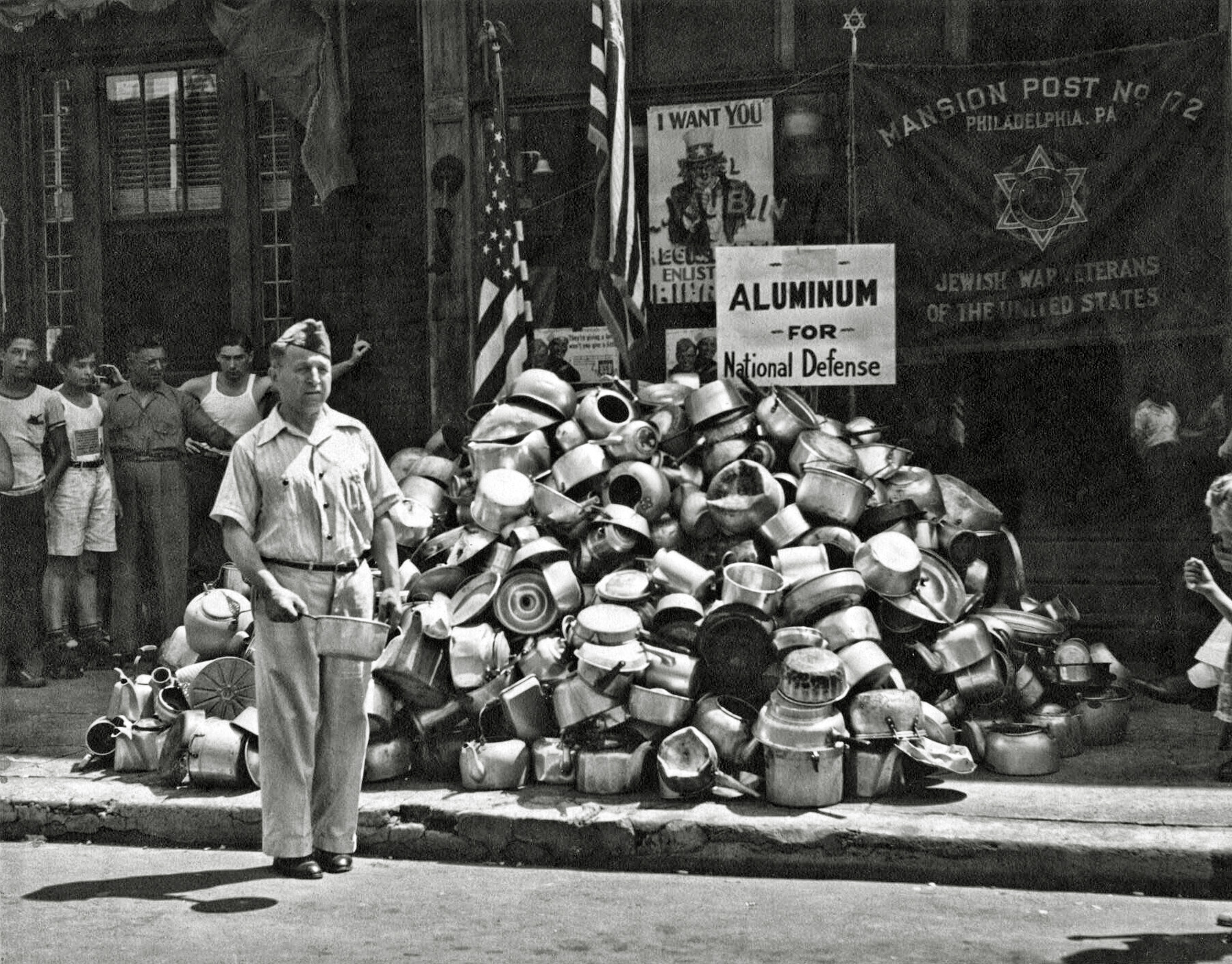 My maternal grandfather, World War I veteran Leo C. Ziv, collecting aluminum for defense in Philadelphia's Strawberry Mansion neighborhood. His lungs had been burned by mustard gas while serving with the American Expeditionary Force. View full size.