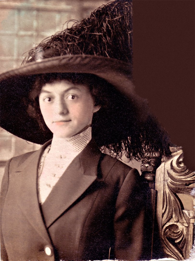 To accompany the picture of  Dad and Cousin Earl, here's a picture of Earl's mother, Lillian Latter (née Miller). Quite the hat, even in the portion of the picture that remains. View full size.

