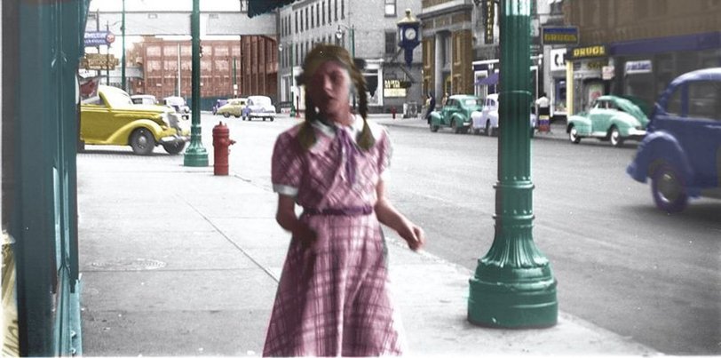Late 1940s, downtown Ilion, NY. The girl in the picture is my sister Ruth. The Remington gun factory with crossover tunnels is down the street. View full size.
