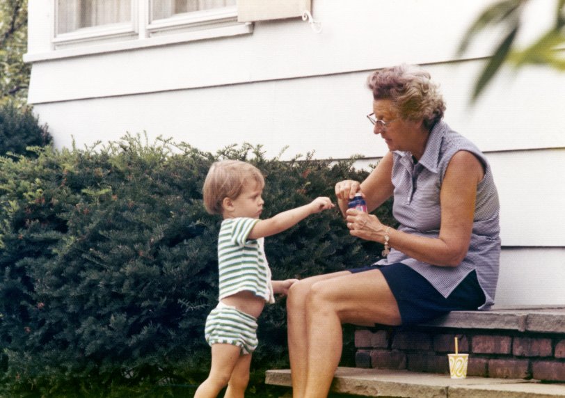 Mom and her first grandson James on the front stoop in Chatham, New Jersey in 1972. View full size.
