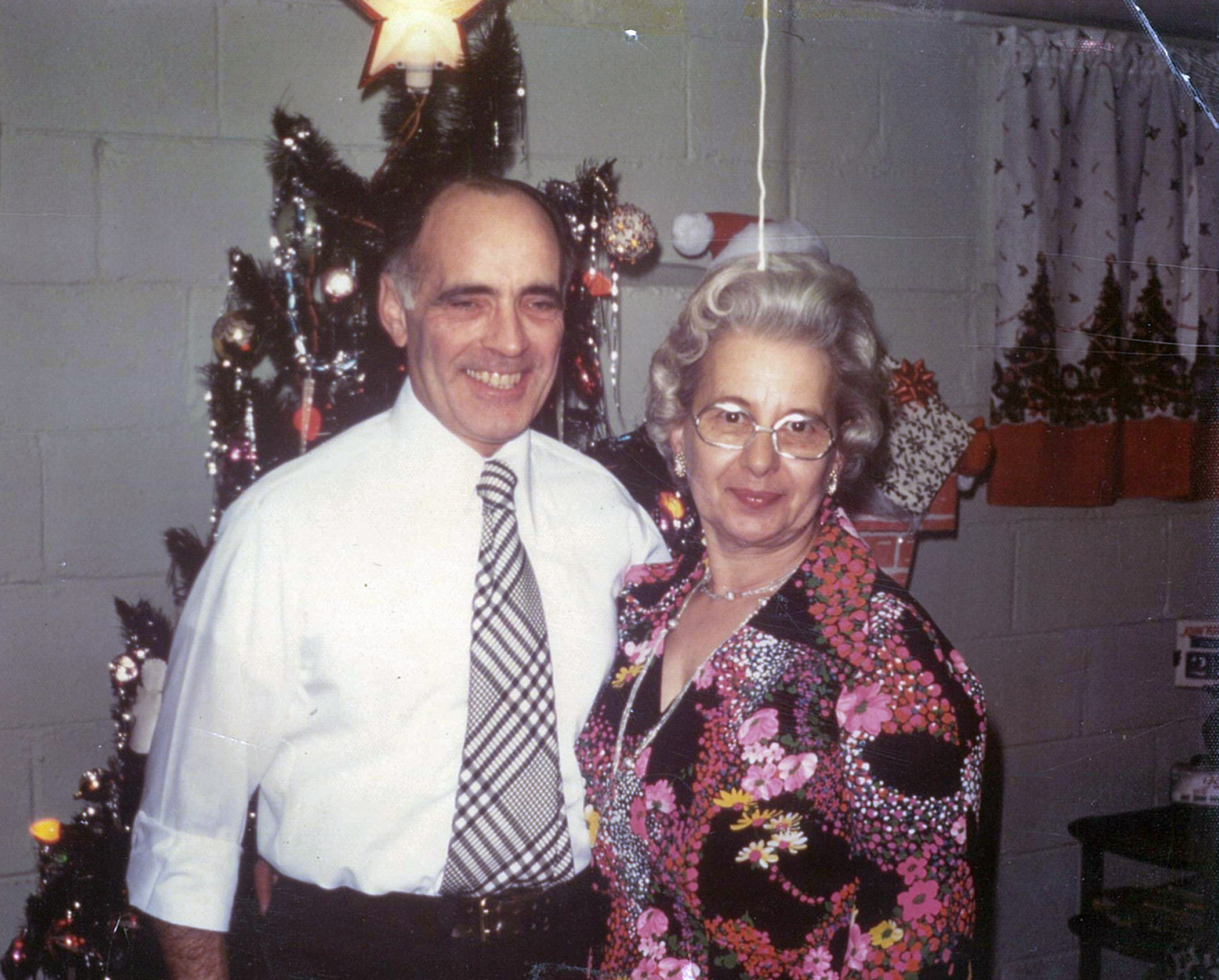 My grandparents, Norm & Mary Ouellette, in their basement sometime in the 1970's. View full size.