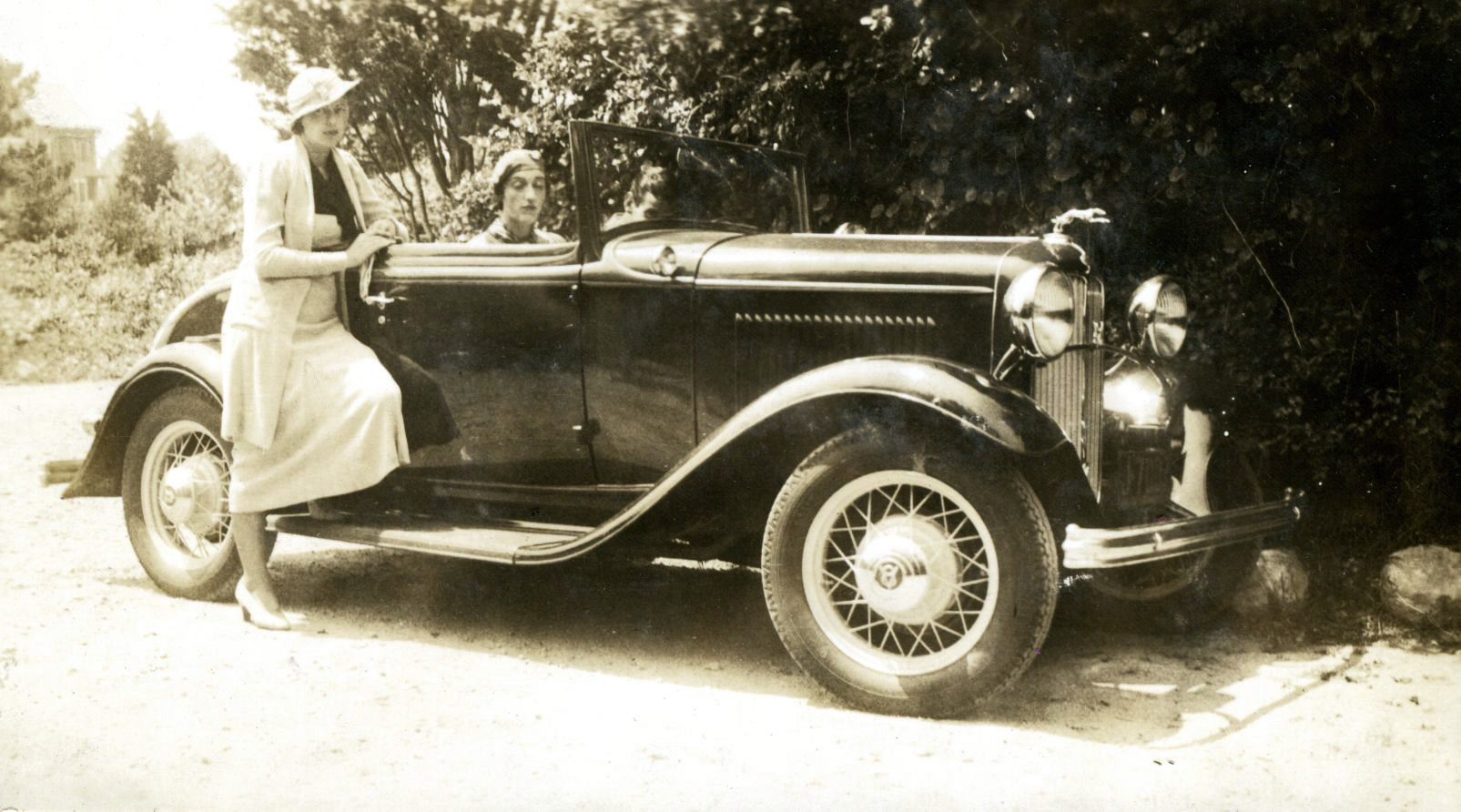 Mary, Persis, and Abby pose with their motorcar that might be a Packard. From an assortment of photos I found in an antique store in Simi Valley, California. View full size.