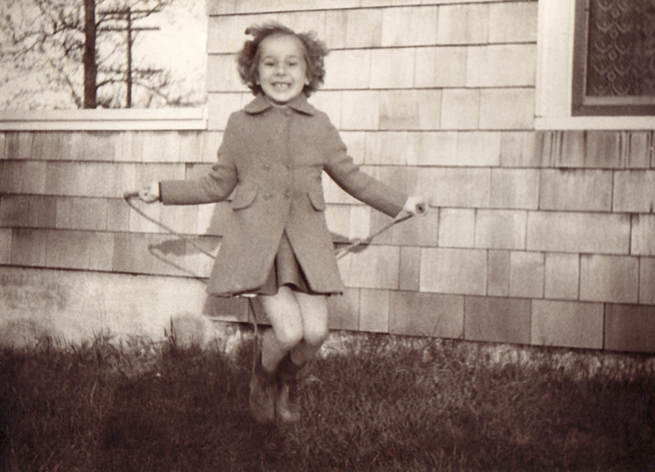 Aileen Chagnon skips rope in front of her home on Maple Ave in Uncasville, CT circa 1945