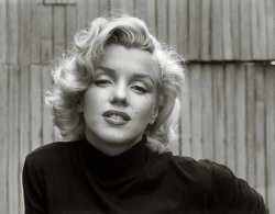 Hollywood, 1953. "Actress Marilyn Monroe, playfully elegant at home." 35mm negative by Alfred Eisenstaedt, Life photo archive. View full size.