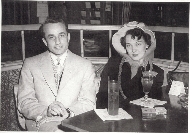 My parents on a date at a downtown nightclub in the early 1950s. Now in their 80s, and married for 57 years, they both love this photo, and so do I. He was a Navy vet from a coal-mining town in Pennsylvania. She was born and raised in the city, and loved to dance. I love the coy look in her eyes. And I love that hat. I wonder what they were drinking, and what they talked about that night. They had their whole life ahead of them. View full size.
