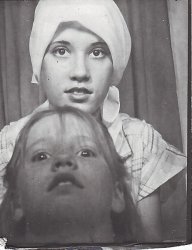 My mother and her younger sister when she was around 15 years old, in a photo booth in Alabama. She's wearing a scarf because she recently had surgery to remove a brain tumor. She suffered from the debilitating mental illness schizophrenia for roughly 25 years until she ended her life in April of this year. I may be biased but i find her and this photograph beautiful. View full size.
Beautiful motherI am very touched by this picture and what you wrote about it.  At first, I was surprised to see that this was taken in 1979, both because it is black and white, and because she is wearing a scarf, but I can see why.  I am very sorry about her struggle with that horrible disease, and also about her recent death. 
StunningWhat a beautiful young woman. A tragic story.
  Striking   It is an extraordinary photograph.  She is beautiful and at the instant of the photo she is luminous.  I am sorry that one who can move us so had to suffer from that bewildering and crushing affliction.  Thank you for letting us see this and know this.
Very beautifulShe has the most gorgeous eyes. So sorry to think she's no longer with you.
CaptivatingI'm just browsing this gallery, but keep coming back to this photo. Very moving story, and your mom has the face and eyes of an angel. Sorry for your loss, and thanks for sharing her story.
(ShorpyBlog, Member Gallery)