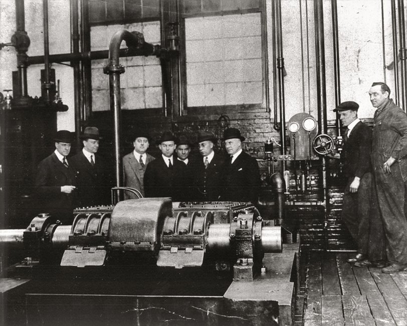 Montague H. Roberts, original driver from Times Square, of Thomas Flyer in the New York-Paris Race of 1908 (he steered the car to Cheyenne, Wyoming -- had to leave for prior race commitment) seen here in later years, second from left. He was instrumental in the invention of the "Franklin Booster,"  shown here, a device that assisted locomotives in climbing steep grades. He was the grandfather of my wife, Cindi.
