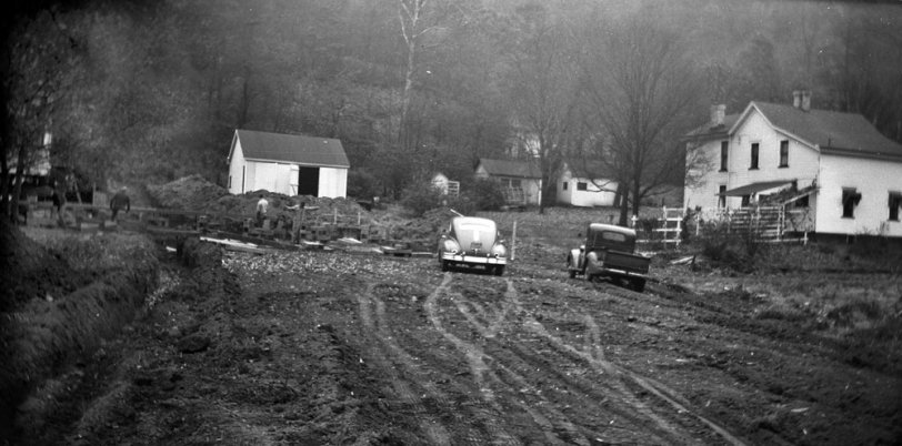 This was taken around 1950. My Grandparents had sold some property with the agreement that my great Aunt's and their home would be moved to the property the developers hadn't purchased. My great Aunt refused to leave the house so she was moved right along with it. (From a 2 1/2 X 3 in negative). View full size.
