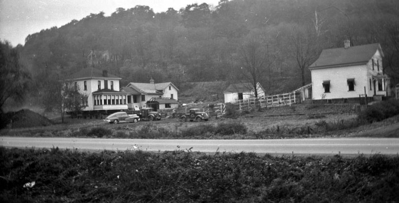 Another picture of house moving in 1950. View full size.
