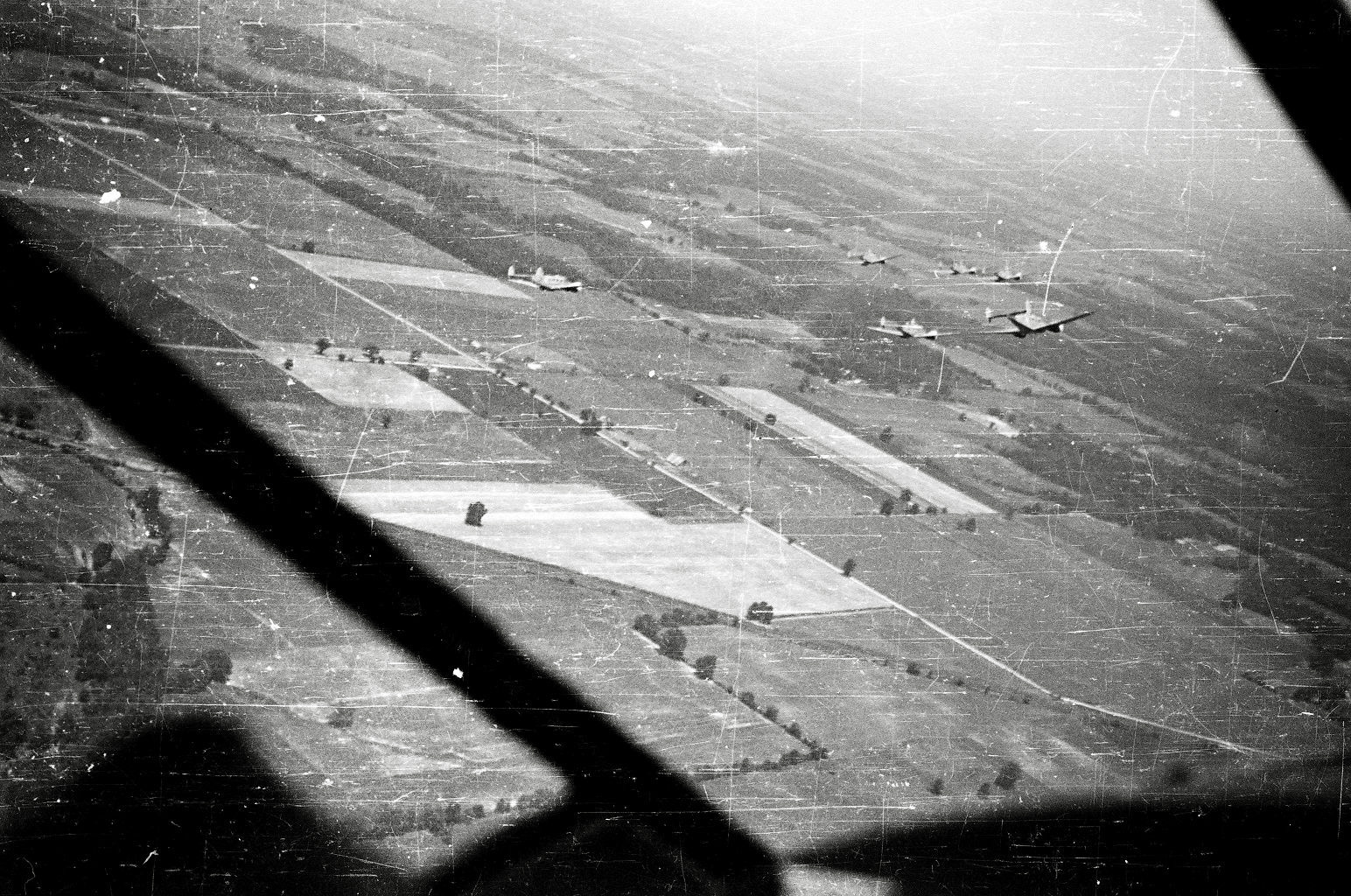 From a collection of WW2 negatives I recently acquired. Aerial shot of US planes in air somewhere in Europe. View full size.