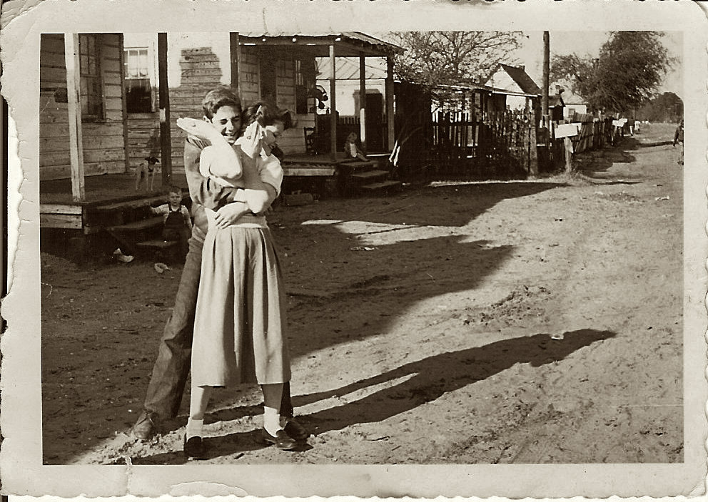 An early 1950s photo of my aunt playing with her fella in Georgetown, S.C.  There was widespread poverty in South Carolina well into the 1960's.