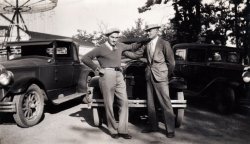 I wish I could tell you more, but all I know is that this is my father (on the right) with a friend at some sort of carnival or fair, in New York. Can anyone identify the make and year of the cars? That would help me narrow down the possibilities. View full size.
CarsThe men are standing in front of a Model A Ford, most likely a 1930. The car to the left is possibly a late 20's Buick. The car on the right is possibly another Model A Ford, also 1930, and appears to be a two door (Tudor) Sedan.
(ShorpyBlog, Member Gallery)