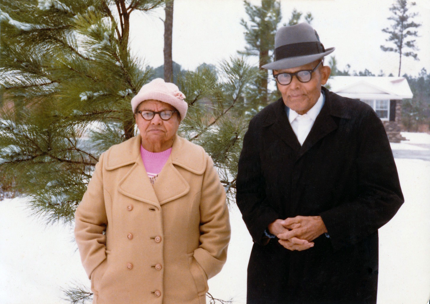 These are my paternal great-grandparents Charles and Ella Hawkins (my grandfather's parents), standing outside their home in Lake City, S.C. in the snow. View full size.