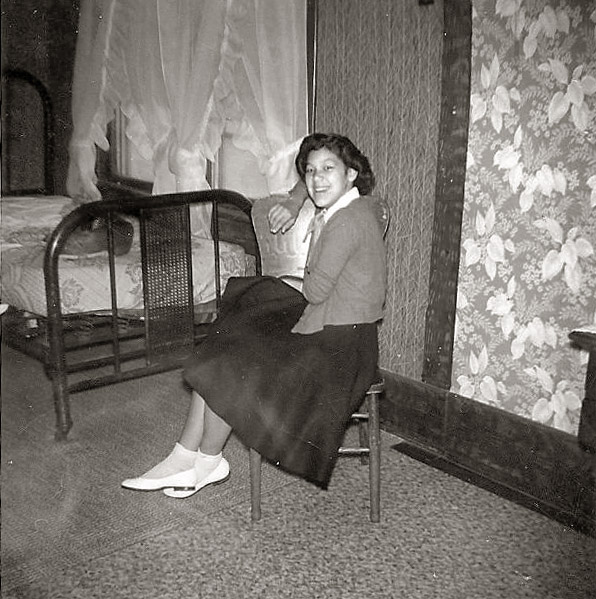 Here is a picture of my Mom Kay. Her maiden name was Tuders. She was 11 years old here. She told me how proud she was of her new shoes in this picture, they were very poor. She didn't get very many new things. She met my dad two years after this when she was 13, and married him at 14. Way too young to get married then and now. They divorced 10 years later. View full size.
