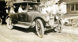 A neat old 1920's car full of people. What kind of car it is and what it says on its door stumped the crew I was with on June 4, 2014. We drove a 1956 Studebaker to an antique store in Simi Valley, California. I bought 71 old photos (mostly of cars). Then we sat down to figure out what the cars were. No guesses on this one. View full size.
BuickLooks to be a Buick, c.1920.
(ShorpyBlog, Member Gallery)