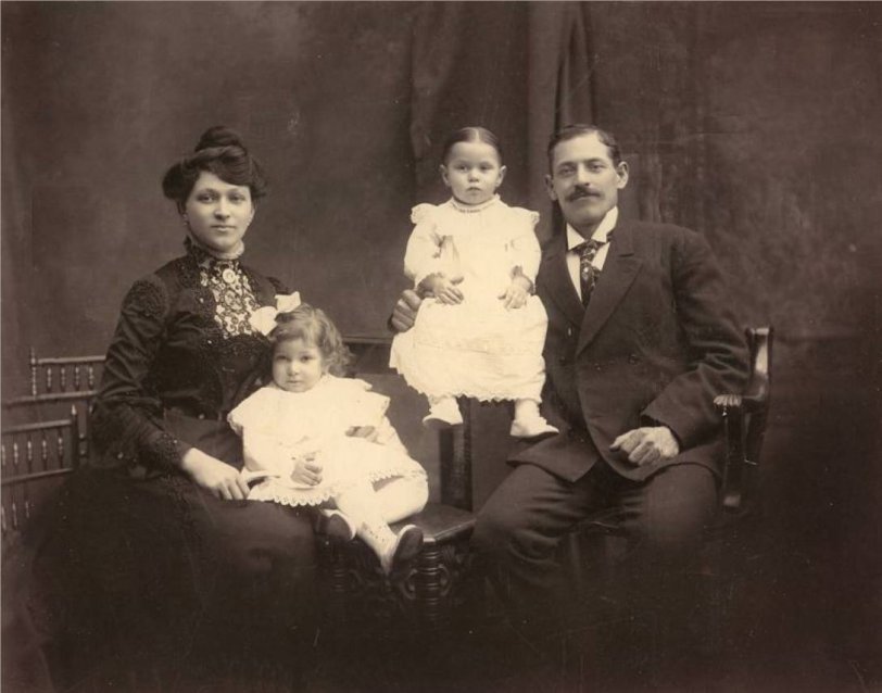 This studio portrait of my grandparents and two of their children was taken in Romania around 1903, shortly before they came to the United States. The girl held by Sam died soon afterwards. The other girl was my aunt and lived to 90, becoming a great-grandmother. Sam was a tinsmith for most of his life.
