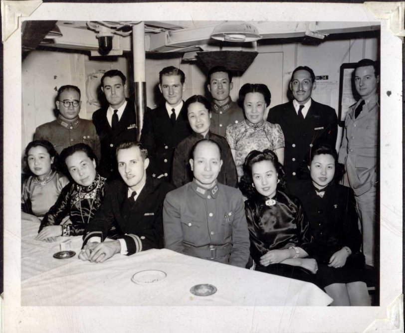 This is a group shot that appears to have been taken aboard ship.  This is China, c. 1946.  Grandpa was stationed in China as a U.S. Army Captain. Grandma is the Chinese lady seated in the lower right. The Chinese Nationalist officer seated in the center was my great uncle, and his wife is seated next to him. We have heard he was a pilot, but haven't confirmed this. I know nothing of the others in the photo, other than basic ranks. The young mustachioed Lieutenant seated next to my great uncle appears to be from the nursing or dental staff corps, judging from the leaf on the sleeve.  That's all I know. View full size.
