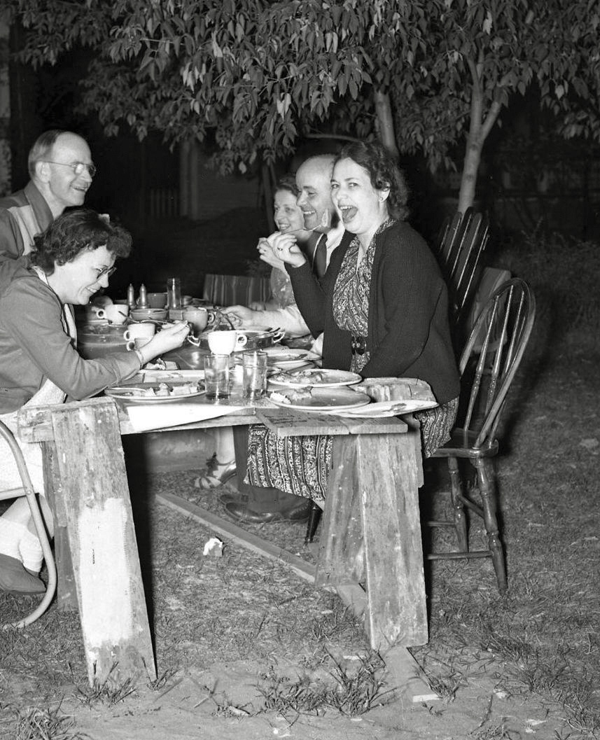 A picnic at night time? Sure why not? These people are having fun. Try it yourself. From my negatives collection. View full size.