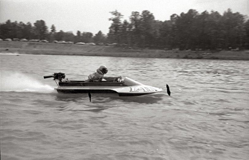 This is John Griffin in a promotional hydroplane race at Nita Lake in 1960.  John was world champion in Class A, Class B and Class C hydroplanes for a number of years in the 1950's.  He was teamed with world class mechanic Ray Cother, who built the Konig engines John raced with.  These two men were an unbeatable team when they were at their peak.  They were based in Tupelo and Grenada, Mississippi.

