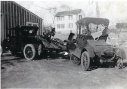 Brainerd's Garage, Stony Creek, CT. Our first wrecker, a 1911 Pope Hartford dragging in two very tired looking Model T Fords. Taken sometime in the early 1920's the garage looks the same today although we no longer do our own towing.
(ShorpyBlog, Member Gallery)