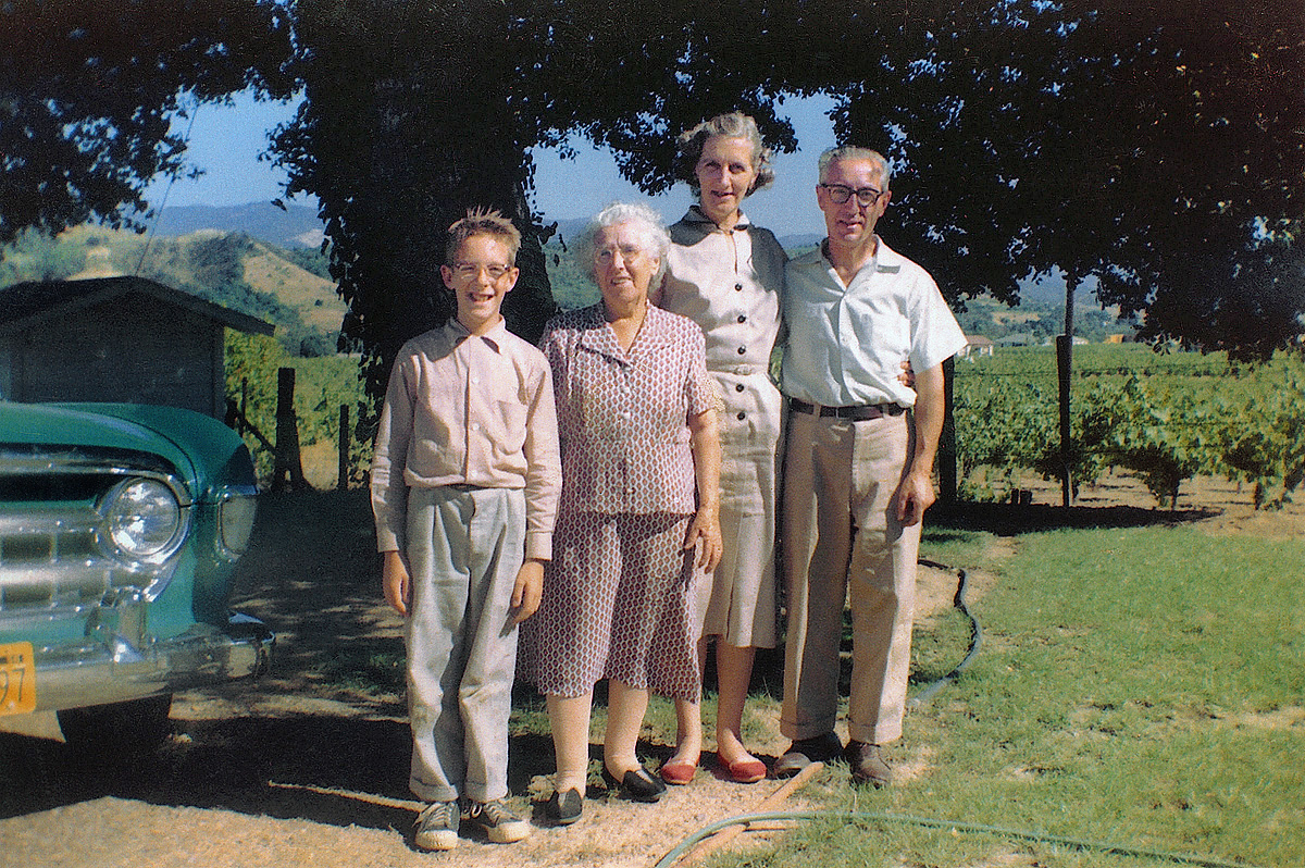 For 50 years I was completely unaware of the existence of this 1957 photo of me, my grandmother, mother and father until a chance event unearthed it in Italy two years ago. My brother and sister, visiting our father and grandmother's home town of Murialdo, near Genoa, mentioned my grandmother's maiden name to some townspeople, one of whom said, "Oh, maybe that's Luigi. He's usually having coffee down at the trattoria about now." Turns out that Luigi was my grandmother's grandnephew, and he had a cache of photos she'd been sending to the old country since the 1920s. This was one of them. Last year, Luigi's son and daughter-in-law visited us on their honeymoon trip to the States. Shot was taken in Calpella, California. Special guest star: our 1956 Rambler. Scanned from a digital copy of a Kodacolor print. View full size.