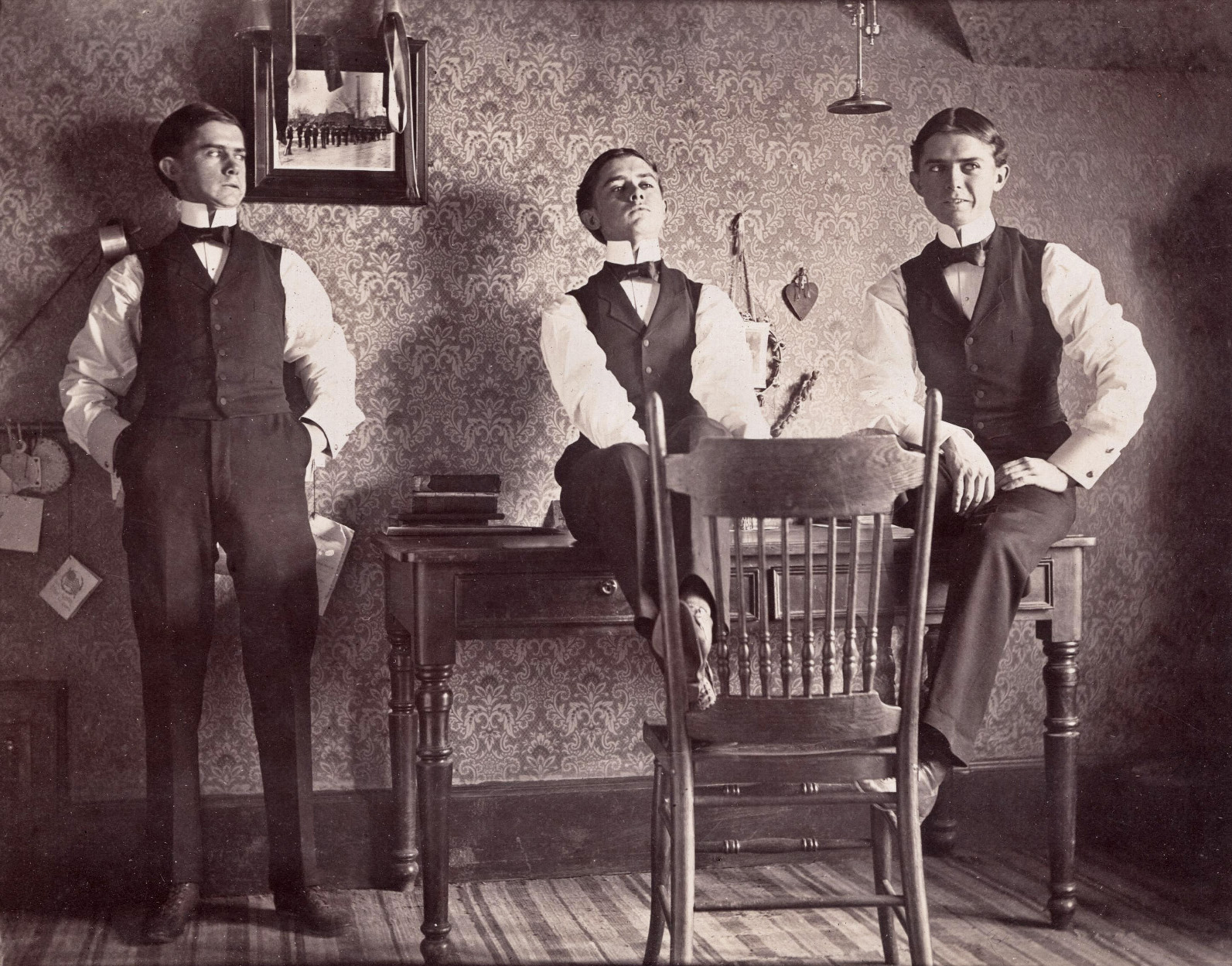 George J. Richardson (1879-1943) shows his puckish sense of humor with a multiple-exposure self-portrait, circa 1898, taken at his family home in north Denver, Colorado. The image is one of several examples of this kind of trick photography in a book of photos by Richardson which can be viewed in its entirety here. View full size.
