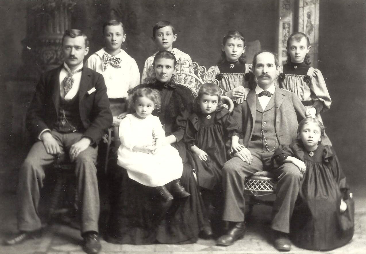 My grandmother Elizabeth is standing in the front row between her mother, Augusta and her father, William. As I was told by my grandmother, this professional photograph was taken of the family because Augusta, at age 36, had to have all of her teeth removed. In those days, there were cases of persons dying from having their teeth extracted. Columbus, Ohio 1895. View full size