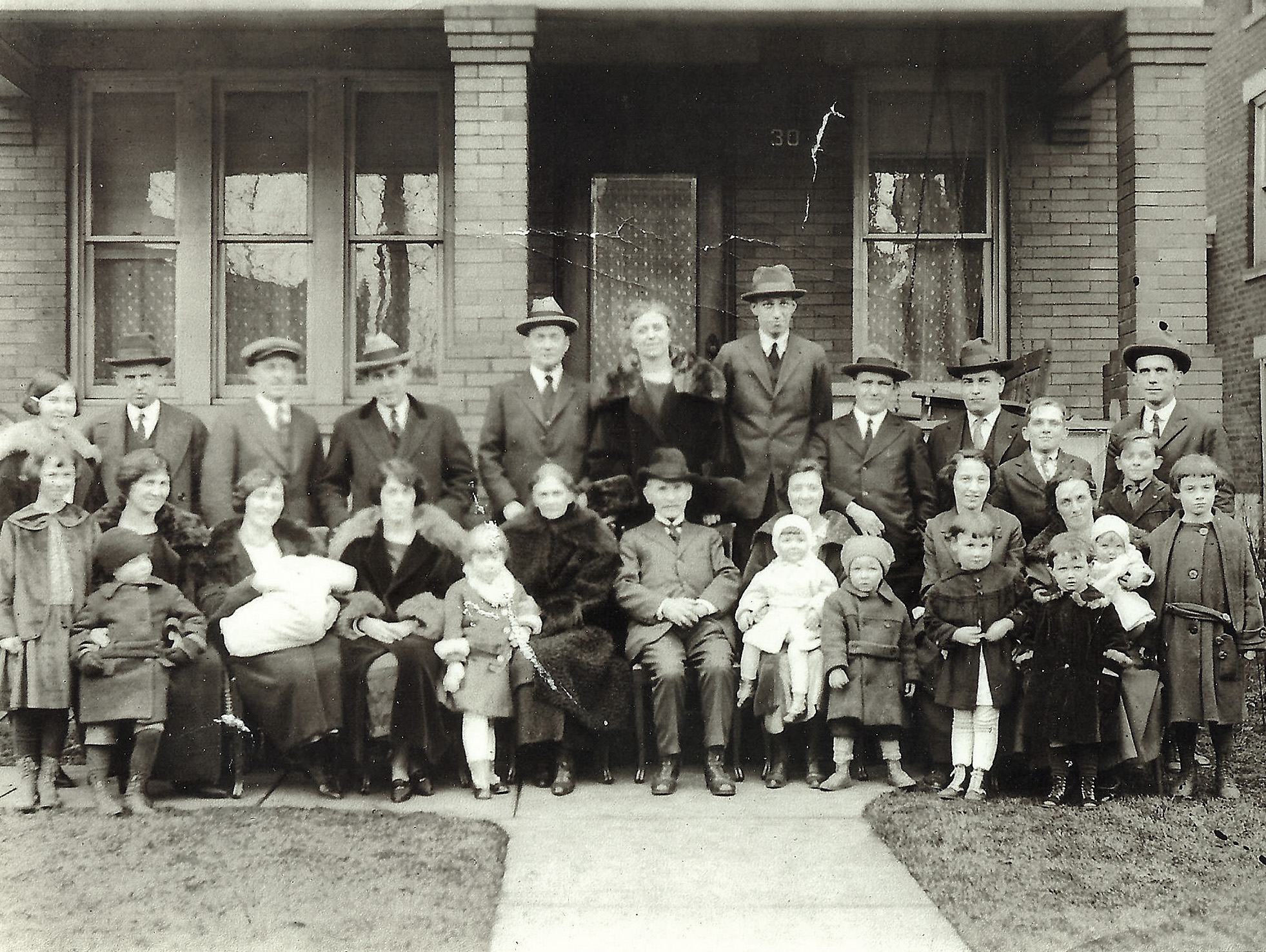 My how the family has grown. After the children married they stayed in the Columbus, Ohio area and spent most Sundays together. On this occasion, the family poses for a picture with Fred and his wife, Belle. View full size.