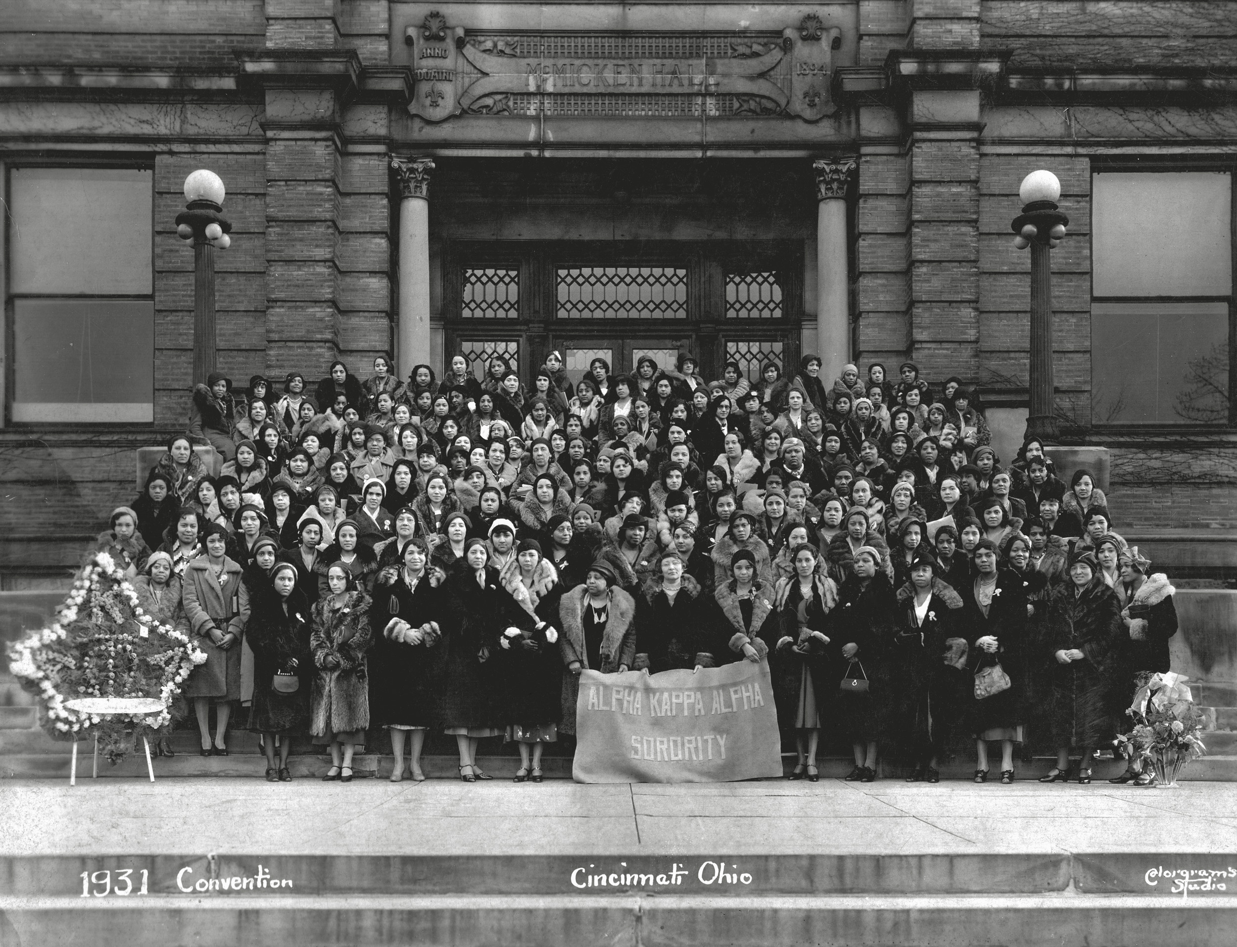 I was scanning my late mother's old photos and I came across this one.  My mother's stepmother belonged to the organization - the Alpha Kappa Alpha Sorority -  from her college days at Ohio State in the 1920s. This is their 1931 convention at the University of Cincinnati. She's in there somewhere. View full size.