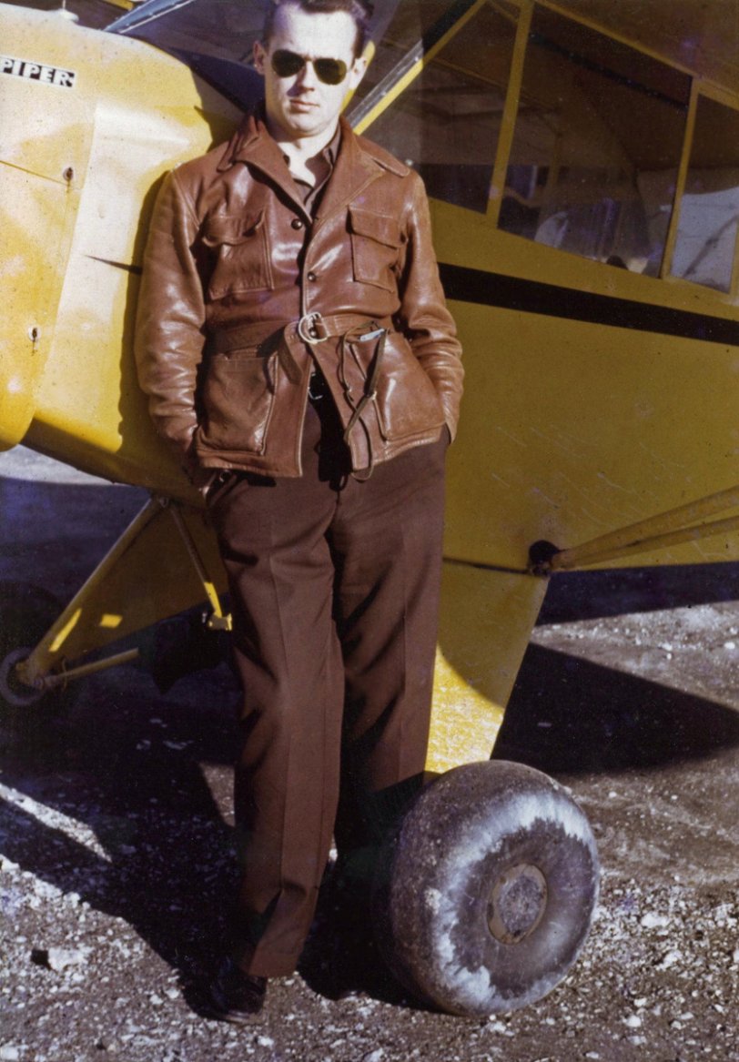 My father, Lee Clough, in 1941, proud of his Piper airplane (and his leather jacket) at Scholes Field in Galveston, Texas. As engineer for the family radio station, KLUF, he was in a critical occupation but flew patrols over the Gulf of Mexico with the Civil Air Patrol. He had his own airplane at age 14. View full size.
