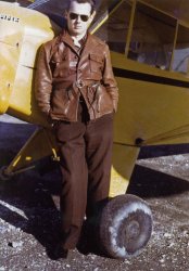 My father, Lee Clough, in 1941, proud of his Piper airplane (and his leather jacket) at Scholes Field in Galveston, Texas. As engineer for the family radio station, KLUF, he was in a critical occupation but flew patrols over the Gulf of Mexico with the Civil Air Patrol. He had his own airplane at age 14. View full size.
(ShorpyBlog, Member Gallery)