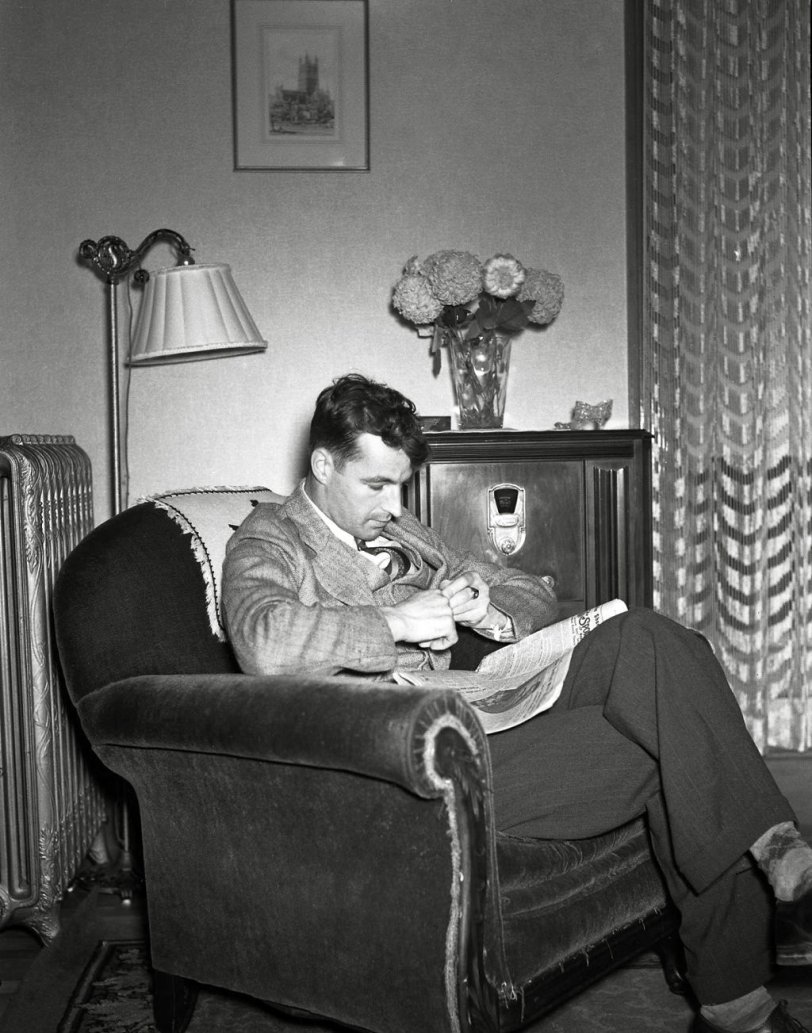 Before the Internet and television, this is how you you would spend a quiet evening at home. From my negatives collection. View full size.
