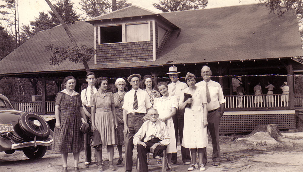 1937, Swanzey Lake, NH. From left, my grandmother, Florence (Carpenter) Tyler, Donald Tyler, Ruth Tyler, Christie Tyler and her husband, Charles Tyler, my mother, Harriet Tyler, "Gene's sec'y", F.H. Tyler (my grandfather), Grace Tyler, and Gene __?__. Albert Tyler, my great grandfather, lost a leg to diabetic complications.